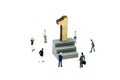 Miniature people : Businessman standing with wooden number of 1,to be the first,Business competition Concept.