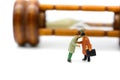 Miniature people : Businessman about to stab his friend,business concept. Royalty Free Stock Photo