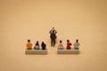 Miniature people businessmen Interview candidates To consider working in the company. The concept used in selecting personnel to