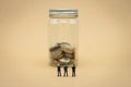 Miniature 3 people businessmen standing with back Negotiating in business. as background business concept and strategy concept Royalty Free Stock Photo