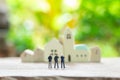 Miniature 3 people businessmen standing with back Negotiating in business. as background business concept and strategy concept Royalty Free Stock Photo