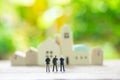 Miniature 3 people businessmen standing with back Negotiating in business. as background business concept and strategy concept Royalty Free Stock Photo