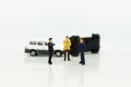 Miniature people: Car crash, Insurance business. Image use for not living with carelessness, danger on the road, carefully concept Royalty Free Stock Photo