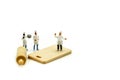 Miniature people : Chef during cooking and working on white back Royalty Free Stock Photo