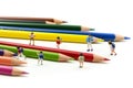 Miniature people : children and student with colorful drawing tools and stationary,education concept Royalty Free Stock Photo