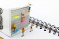 Miniature people: Climber climbing on book . Image use for learning, education concept