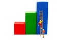 Miniature people: Climber looking up while challenging route