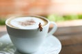 Miniature people : Coffee cup with businessman , image use for charge your energy in the morning