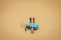 Miniature people Construction worker Security Key Repair And the treatment of the precious. on white background using as Royalty Free Stock Photo