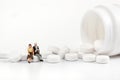 Miniature people - Elderly people posing in front of pills