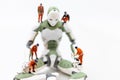 Miniature people : Engineering is developing an AI robot system, using labor instead of people. Image use for new technology in Royalty Free Stock Photo