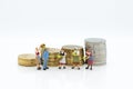 Miniature people :Farmers with basket vegetable ,fruit. Image use for agricultural crops