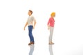 the miniature people. figures of a man and a woman on a white background. communication and relationship building. problems in