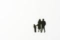 Miniature people flat in black, father, mother and son on white background with copy space. In concept family Royalty Free Stock Photo