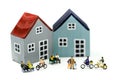 Miniature people : Friend Group ride bicycle with family of house,happy family day concept