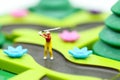 Miniature people : golfer stand with children`s toys collection,