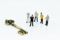 Miniature people: Group Businessmen stand with master key. Image use for key man, the key to success, business concept