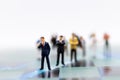 Miniature people: Group of businessmen work with team. Image use for background choice of the best suited employee, HR,job