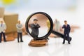 Miniature people, Group of businessmen work with team, using as background Choice of the best suited employee, HR, HRM Royalty Free Stock Photo