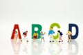 Miniature people: Group childrens at school. Image use for education concept. Royalty Free Stock Photo