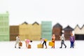 Miniature people: Group people carry a bag suitcase. Image use for business concept Royalty Free Stock Photo