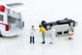 Miniature people : Injured personal from road accidents, ambulance transported to the hospital for treatment. Royalty Free Stock Photo