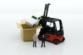 Miniature people : Man of auto insurance when an accident on the road. Image use for Make an agreement, responsibility, business Royalty Free Stock Photo