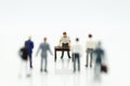 Miniature people : Men are being blamed for wrongdoing. Image us Royalty Free Stock Photo