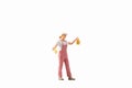 Miniature people, painter holding paint brush on white background with clipping path Royalty Free Stock Photo