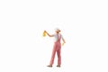 Miniature people, painter holding paint brush on white background with clipping path Royalty Free Stock Photo