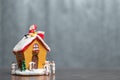 Miniature people painting house and Santa Claus sitting on the r Royalty Free Stock Photo