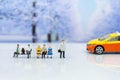 Miniature people: passenger waiting vehicle for go to destination, transportation. Image use for business background concept.
