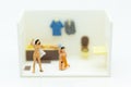 Miniature people : personal wearing a dress in the toilet, daily routine, personal errands in the bathroom