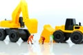 Miniature people : professional construction engineer with businessmans,industrial engineering business concept Royalty Free Stock Photo