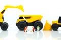 Miniature people : professional construction engineer with businessmans,industrial engineering business concept Royalty Free Stock Photo