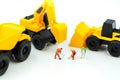 Miniature people : professional construction engineer with businessmans,industrial engineering business concept Royalty Free Stock Photo