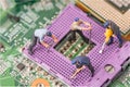 Miniature people repair cpu board