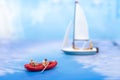 Miniature people, Rowing boat in the ocean. Image use for sports concept