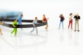 Miniature people running to tape cassette for winner . Image use for healthy , exercise concept Royalty Free Stock Photo