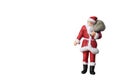 Miniature people Santa Claus carrying bag Royalty Free Stock Photo