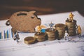 Miniature people or small figure worker on coin arranged. Business Financial Planning Financial Analysis for Corporate Growth Royalty Free Stock Photo