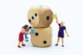 Miniature people: Students read books, keep books on bookshelves made of dice. Image use for education concept Royalty Free Stock Photo