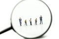 Miniature people : Successful businessman with magnifying glass of young businessman,Business Growth concept Royalty Free Stock Photo