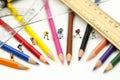 Miniature people : teacher and student with colorful drawing tools and stationary of school bus,education concept Royalty Free Stock Photo