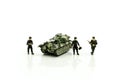 Miniature people : team soldier standing together with army tan