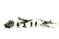 Miniature people : team soldier standing together with army tank and aircraft air combat using for Toy Soldier Day concept