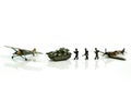 Miniature people : team soldier standing together with army tan