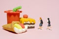 Lunch break concept. Two girl pupil students running toward cake and soft drink Royalty Free Stock Photo