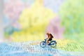 Miniature people : traveler walking on the map Thai language. Used to travel to destinations on travel business background concept Royalty Free Stock Photo