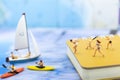 Miniature people : Travelers have activities on the beach and swimming on blue ocean. Image use for sport, vacation ,travel